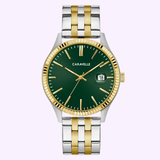 The Caravelle Watches By Bulova Men’s Watch, model 45B162, features a green dial, gold hour markers, date at 3 o’clock, fluted gold bezel, and a two-tone stainless steel bracelet—reflecting premium Bulova style.