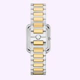 A close-up of the Tory Burch Watches THE KIRA SQUARE Women TBW6021, a designer watch with a rectangular face and alternating silver and gold link metal band, displayed on a pale light purple background.