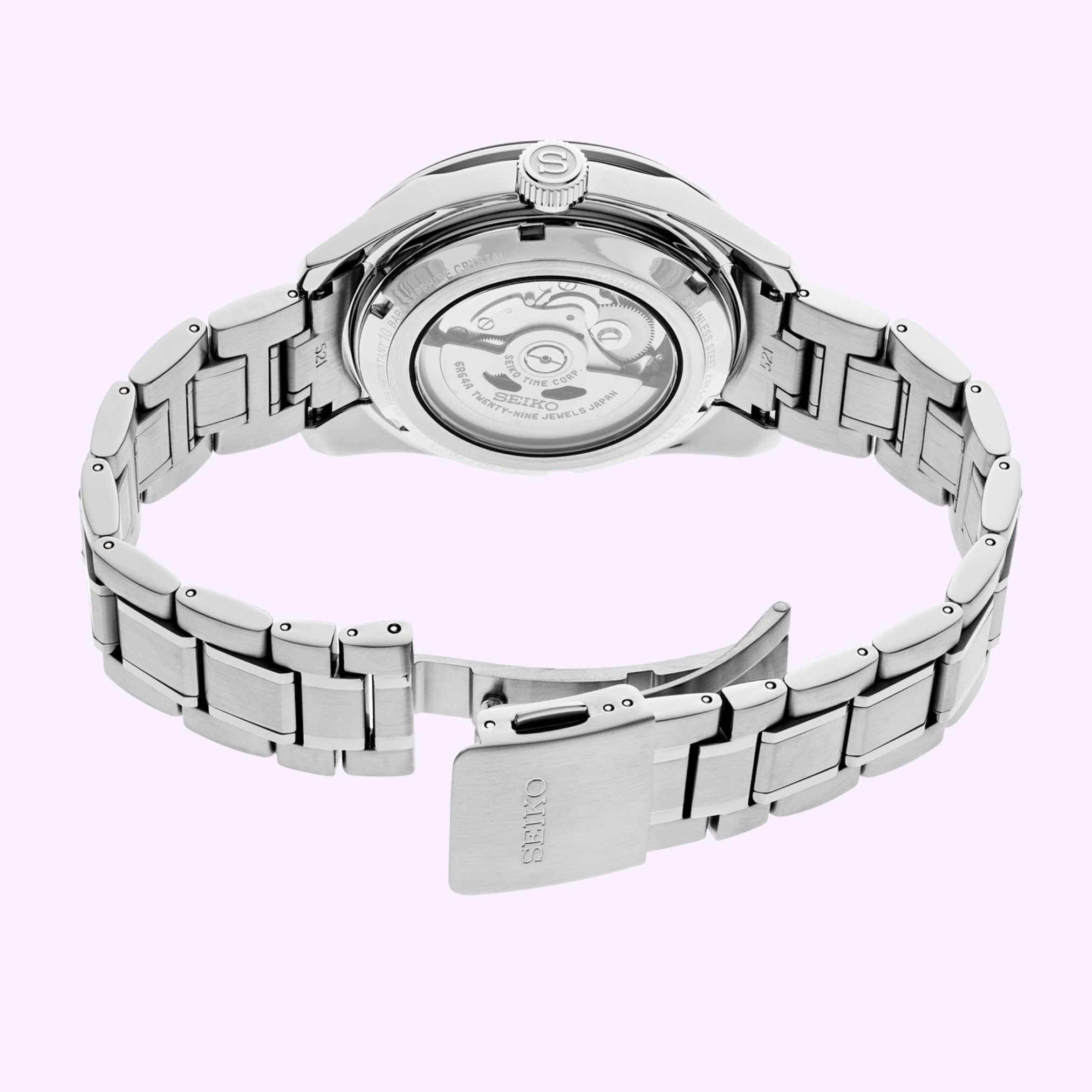 The Seiko Luxe Watches PRESAGE SHARP-EDGED SERIES GMT SPB221 is seen from the back, highlighting its stainless steel bracelet and transparent case back that reveals the automatic GMT movement and fine Japanese craftsmanship.