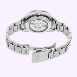 The Seiko Luxe Watches PRESAGE SHARP-EDGED SERIES GMT SPB221 is seen from the back, highlighting its stainless steel bracelet and transparent case back that reveals the automatic GMT movement and fine Japanese craftsmanship.