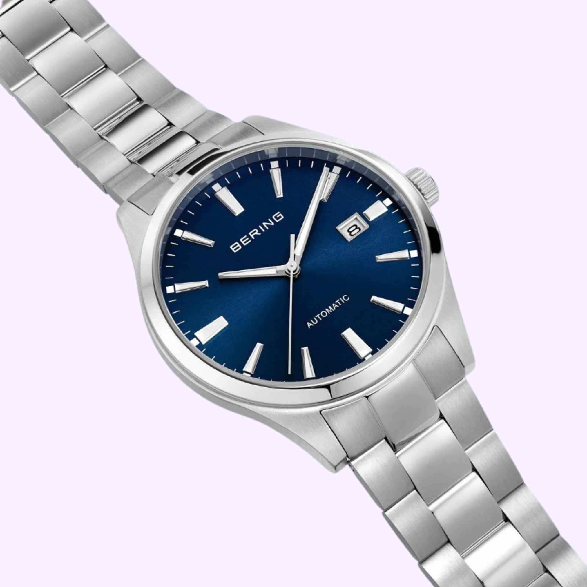 The Bering Watches Classic 19842-707 features a silver case and metallic band, blue dial with silver markers, and date window at 3 o’clock—an elegant example of Scandinavian minimalism by Bering Watches.