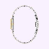 A side view of the Bulova Watches Sutton 98L330 women's two-tone watch with gold accents and a slim stainless steel bracelet, displayed against a light purple background.