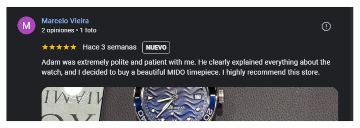 A Google review by Marcelo Vieira gives five stars, praising Adams politeness and clear explanations about a MIDO watch. Below the review is a close-up photo of a blue MIDO watch face and part of its strap.