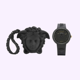 The Versace Watches VE6G00223 Medusa Pop Silicone Women’s Watch in black, featuring a Medusa head design, is displayed with its matching case and decorative wristband on a light background. This Swiss Made quartz watch showcases modern elegance.