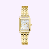The Bulova Watch Sutton 97L177 Women by Bulova Watches features a gold-tone rectangular case, white mother-of-pearl dial with gold hands, Roman numerals at 6 and 12, and a gold link bracelet, shown on a light purple background.
