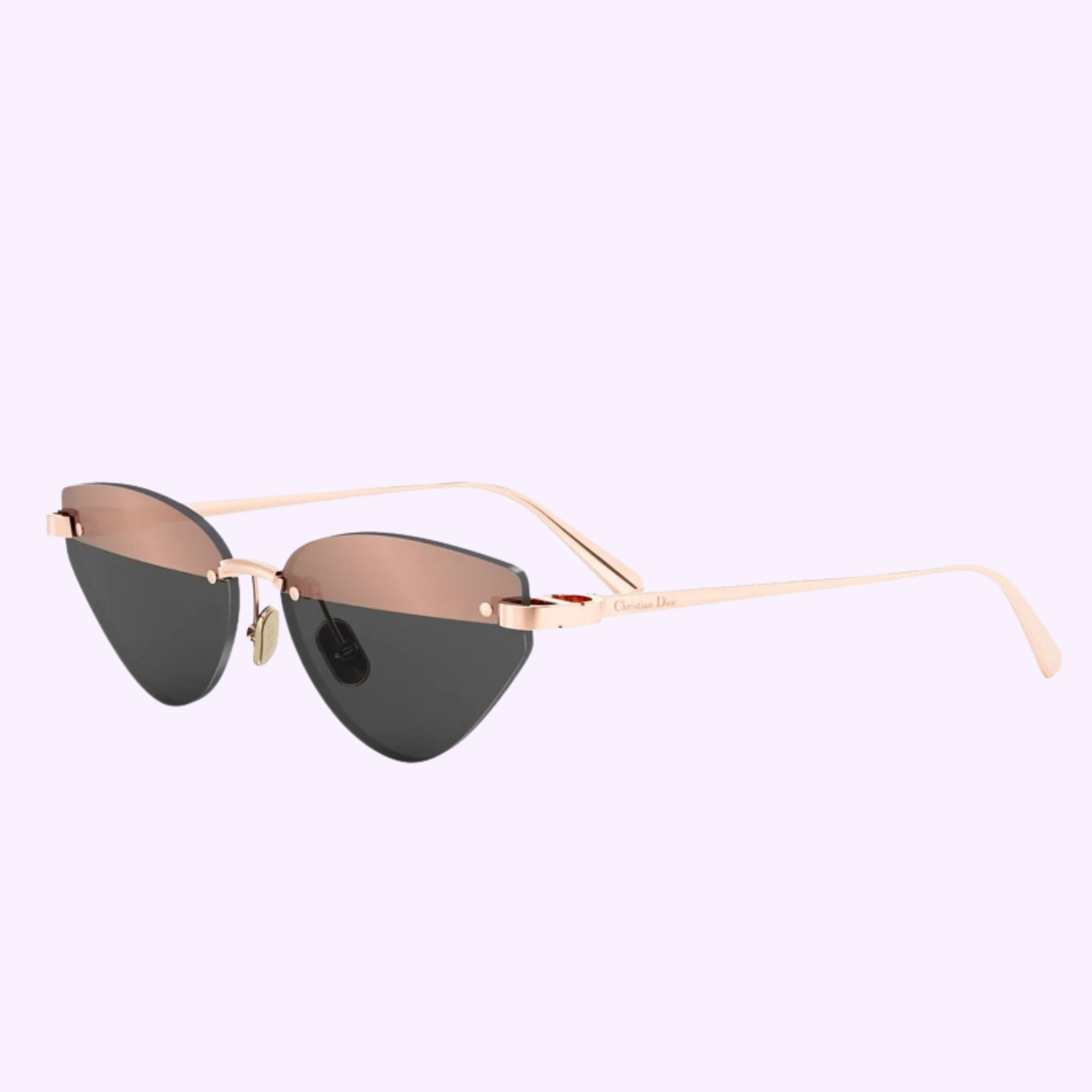 Dior Sunglasses CDIOR B5U CD40196U 5710Z feature gold frames with heart-shaped, dual-toned lenses—pink on top and dark gray below—set against a light purple background, adding Miami flair. Available from an authorized dealer.
