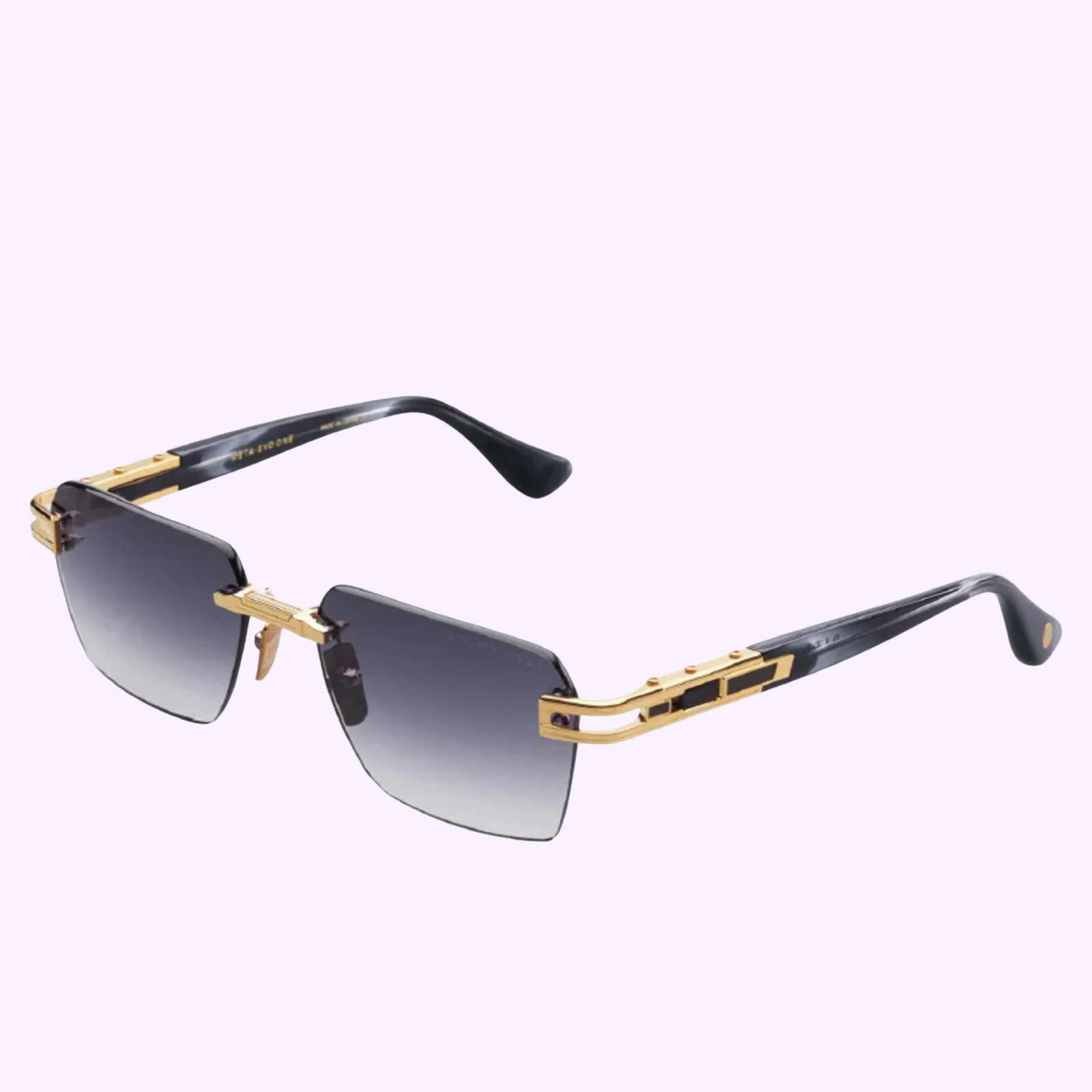 DITA Meta-Evo One DTS147-A-01 rimless sunglasses with gold titanium arms and gradient gray lenses