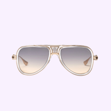 A pair of LIMITED EDITION Dita Sunglasses DTS460-A-03 GRAND-DECADE Unisex with a transparent beige frame and gradient lenses, shown on white with LEXOR MIAMI and DITA EYEWEAR logos, feature the iconic GRAND-DECADE design.