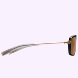 Side view of the Dita Sunglasses LSA-404 DLS404-56-01RO by Dita Sunglasses, featuring gold metal arms, gray ear pieces, and rectangular brown polarized lenses, displayed against a light purple background—a testament to exceptional Japanese craftsmanship.