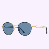 Fred FG40028U 90V 52 Force 10 unisex sunglasses by Fred Sunglasses feature gold frames, round dark blue lenses, and black temple tips with UV protection—stylish and functional eyewear for everyday use.