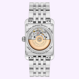 Rear view of the Frederique Constant Watches Classics Carrée Automatic FC-303RLB4C6B, a unisex luxury timepiece by Frederique Constant. The silver-toned rectangular case showcases a transparent exhibition back revealing the refined automatic movement and detailed engravings along the rim. Its polished metal link bracelet enhances the watch’s elegant appeal.