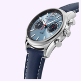 The Frederique Constant Classics FC-397HLBN5B6 is a luxury limited edition wristwatch featuring a blue dial, silver case, blue leather strap with visible stitching, two subdials, silver markers, pushers, crown, and red second hand.