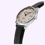 Frederique Constant Classics Quartz Date FC-220CR5B6 watch featuring a silver case, beige patterned dial with Roman numerals, black leather strap, and a date window at the three o’clock position.