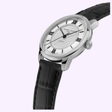 Frederique Constant Watches FC-301S3B6 Classics Premiere silver-tone analog watch with a white patterned dial, black Roman numeral indices, and a black leather strap.
