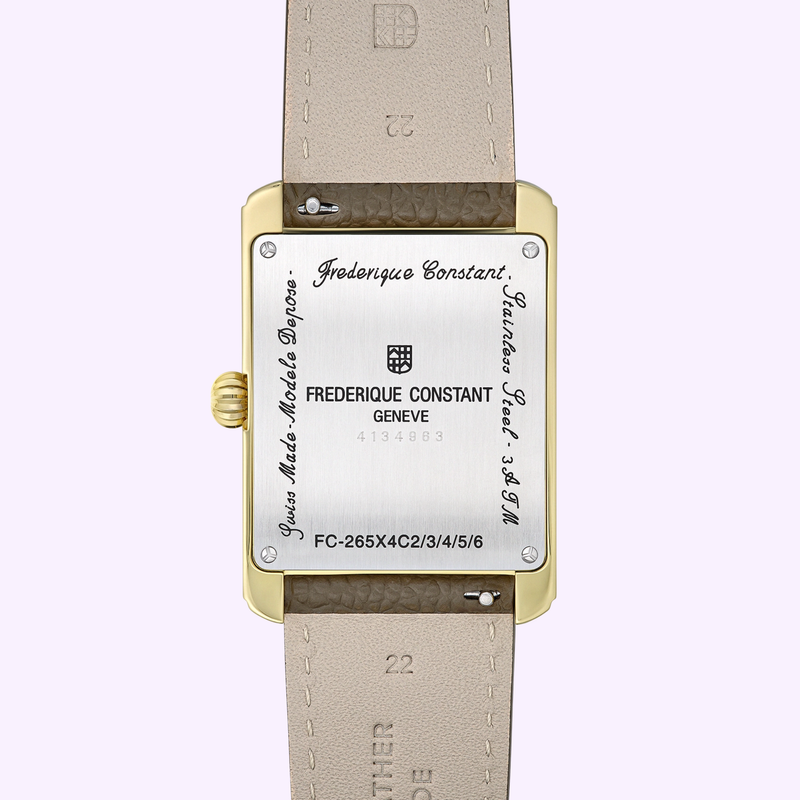 Case back of the Frederique Constant FC-265S4C5 engraved with brand details, model number, and Swiss Made Modele Depose, paired with beige leather strap