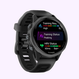 The Garmin Watches Forerunner® 570 - 42mm (010-02970-00) in black features a lightweight aluminum bezel and vibrant AMOLED display showing high training readiness, peaking status, and balanced HRV—with colorful icons and clear metrics.