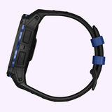 The Garmin Watches Instinct® 3 – 50 mm AMOLED (010-03020-03) by Garmin Watches is shown from the side, featuring a black case with blue accents, textured buttons, an adjustable strap with two blue loops, and a vivid AMOLED display.