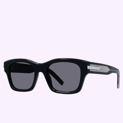 The Givenchy Sunglasses GV40090I 5201A Man features black rectangular frames, dark lenses, and silver temple accents for men, shown against a light purple background.