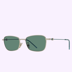 Givenchy Sunglasses GV40123U 5332N WOMAN feature thin metallic full rim rectangular frames, green-tinted lenses, straight teal temple arms, and adjustable nose pads, shown on a light lavender background.