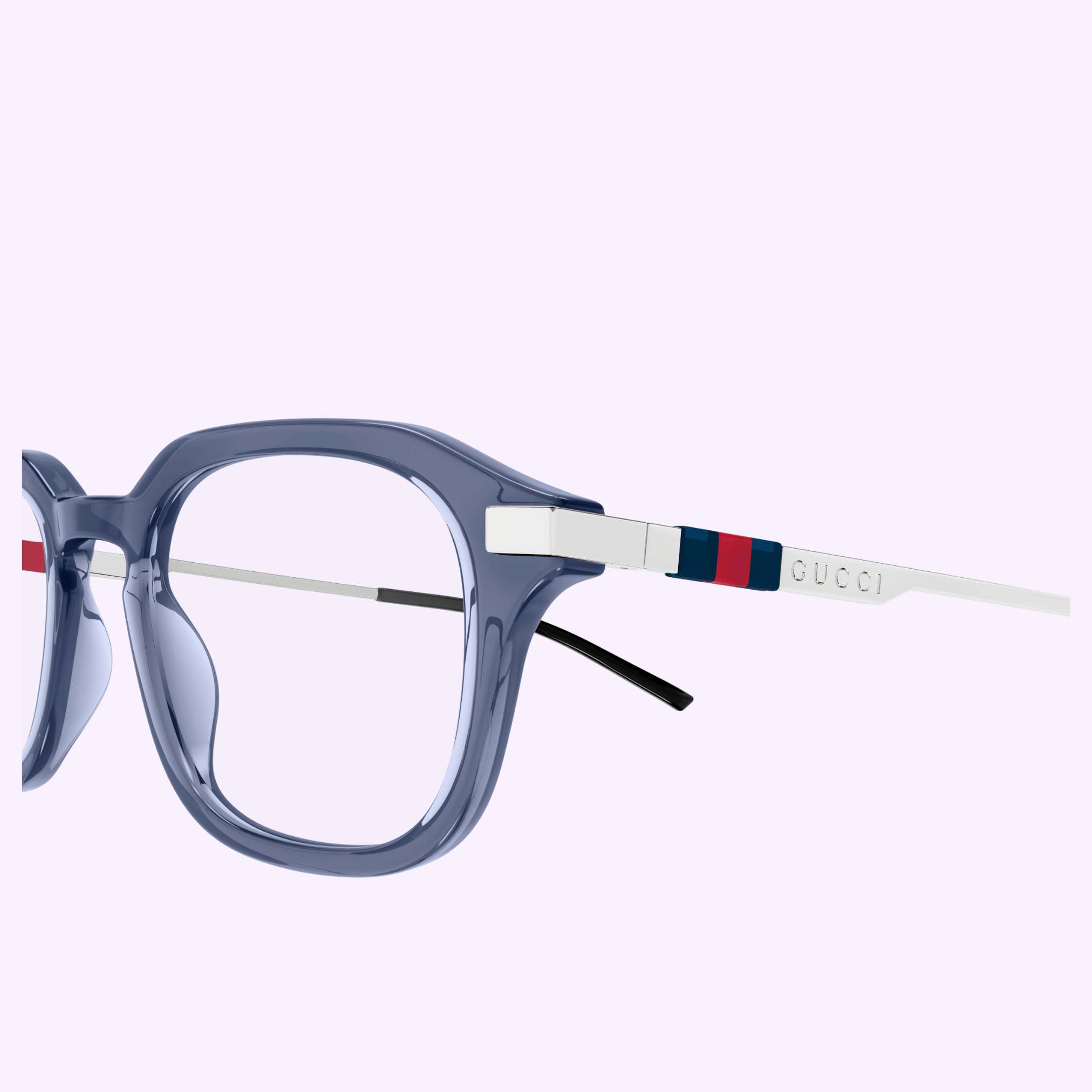 Close-up of Gucci Optical Frames GG1891O-004 49 by Gucci Sunglasses, featuring translucent blue square frames, sleek white temples with red and blue stripes, and the GUCCI logo, embodying luxury style against a light background.