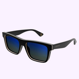 Gucci Sunglasses GG1618SA-003 56 feature a bold square frame and blue gradient lenses. The Gucci logo appears on the arm, reflecting modern luxury style. Shown against a light background. Upc: 889652476506.
