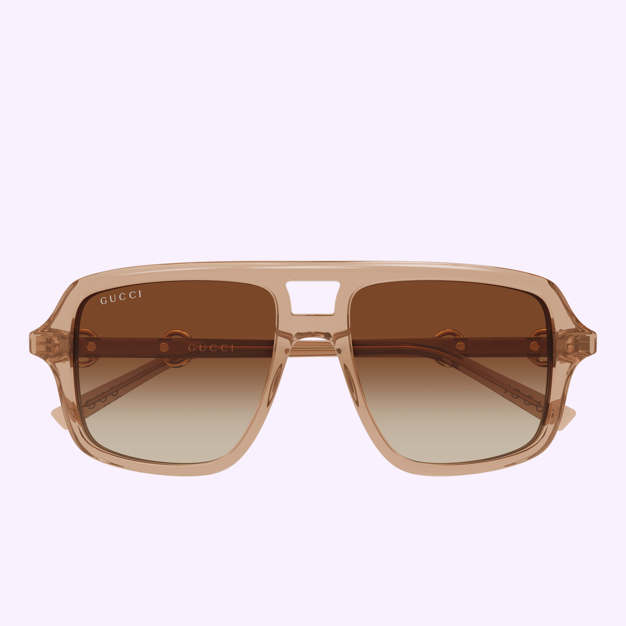 Front view of Gucci Sunglasses GG2052S-010 55 by Gucci Sunglasses, showcasing a transparent frame, brown gradient lenses, and a distinctive keyhole bridge—an iconic luxury accessory—photographed against a light purple background.