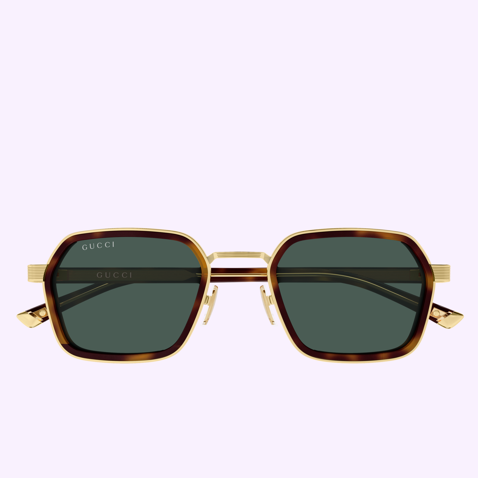 Gucci Sunglasses GG2074S-003 51 feature geometric tortoiseshell frames with gold accents and dark lenses, epitomizing contemporary luxury eyewear, showcased against a pale lavender background.