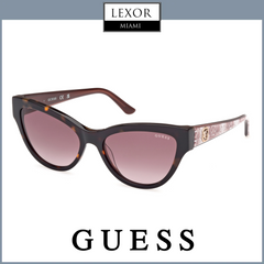 Stylish Guess Sunglasses GU00112 5652F with cat-eye tortoiseshell frame, pink gradient lenses, and gold logo on the temple. A chic choice for fans of fashionable eyewear from GUESS SUNGLASSES and LEXOR MIAMI. UPC: 889214493408.