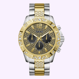 The Guess Watches GOLD GW0796G3 features a gold and silver stainless steel band, crystal-studded gold bezel, textured gold and black dial with three subdials, and sparkling crystal hour markers.
