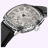 Hamilton Watches H36149710 American Classic Cushion Mechanical watch with an Art Deco cushion-shaped design, silver dial, black leather strap, and an engraved metal bezel.