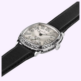 Hamilton Watches H36149710 American Classic Cushion Mechanical Art Deco cushion-shaped watch with a silver dial, black leather strap, and an engraved metal case.