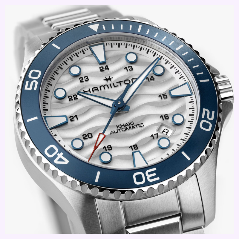 Hamilton Khaki Navy Scuba Auto 40mm H82425110 close up view of dial texture and crown