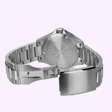 A Hamilton Watches H82425140 Khaki Navy Scuba Auto 40 mm, crafted from stainless steel with its clasp open to reveal the engraved back case and sleek metal bracelet, is displayed on a light purple background. This automatic watch by Hamilton Watches combines robust design with refined style.