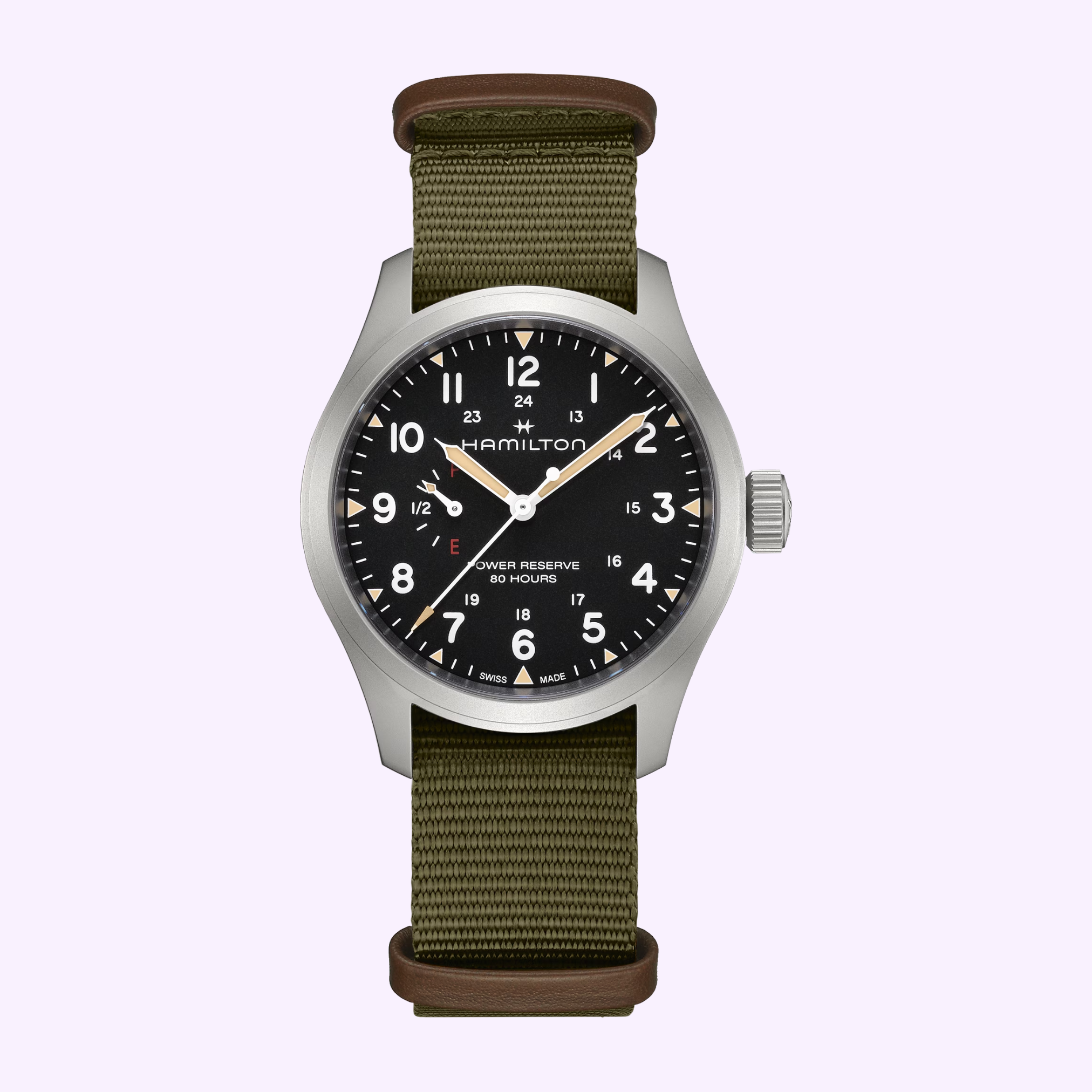 The Hamilton Watches Khaki Field Mechanical Power Reserve 40 mm H69509930 features a black dial with white Arabic numerals, silver case, olive green fabric strap with brown leather accents, and an 80-hour power reserve display.