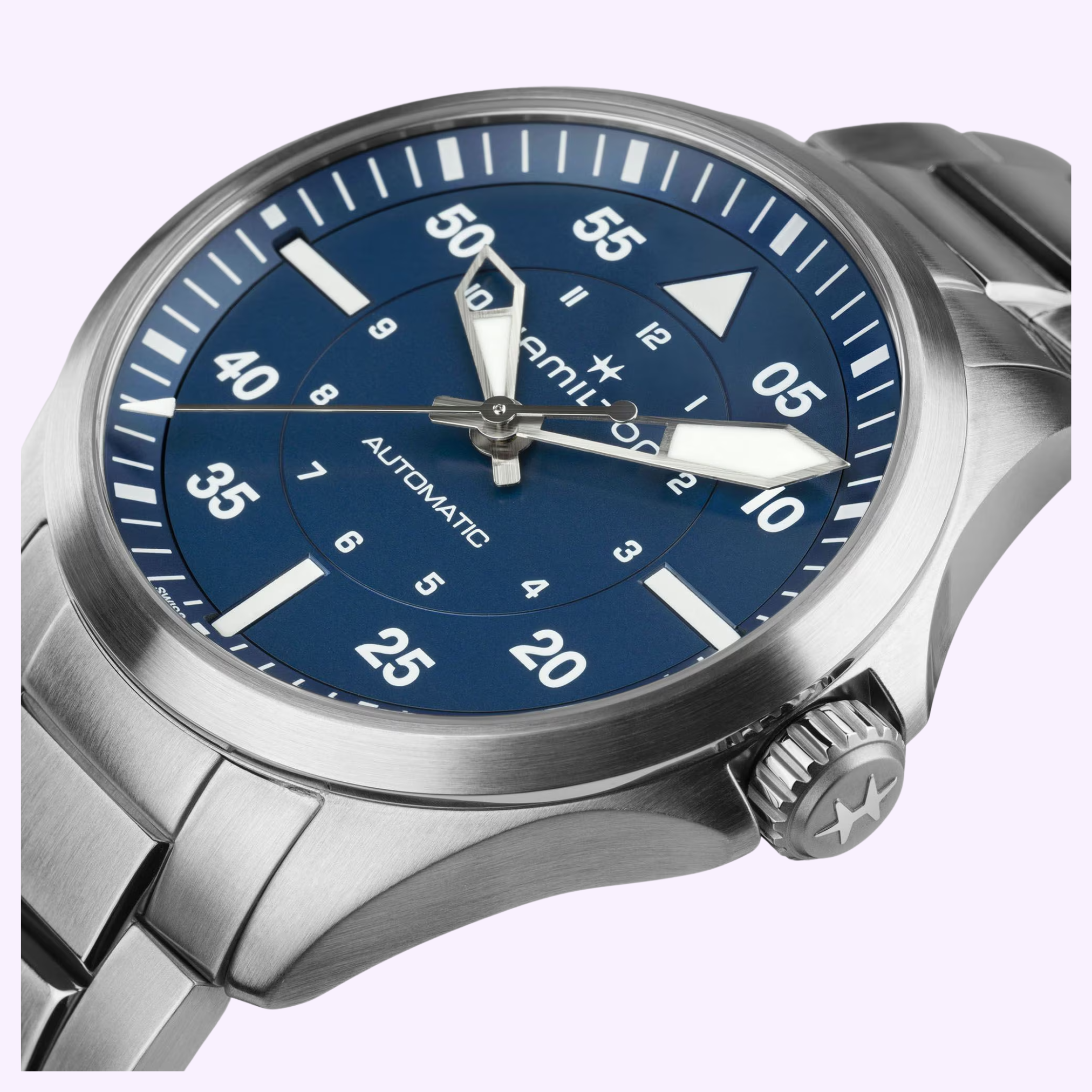 The Hamilton Watches Khaki Aviation Pilot Auto 39mm H76305140 features a stainless steel case, blue dial with white numerals, silver hands, star-engraved crown, metal link bracelet, and bold minute markers.