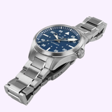 The Hamilton Watches Khaki Aviation Pilot Auto 39mm H76305140 features a stainless steel case, blue dial with white numerals, silver-tone hands and indices, and a metal bracelet. Displayed at an angle on a light background.