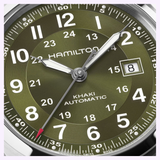 Close-up of the Hamilton Watches Khaki Field Auto 42mm H70605560, showcasing its olive green dial with white numerals and hands, date window at 8, and red-tipped second hand. The time shown is 2:08:40.