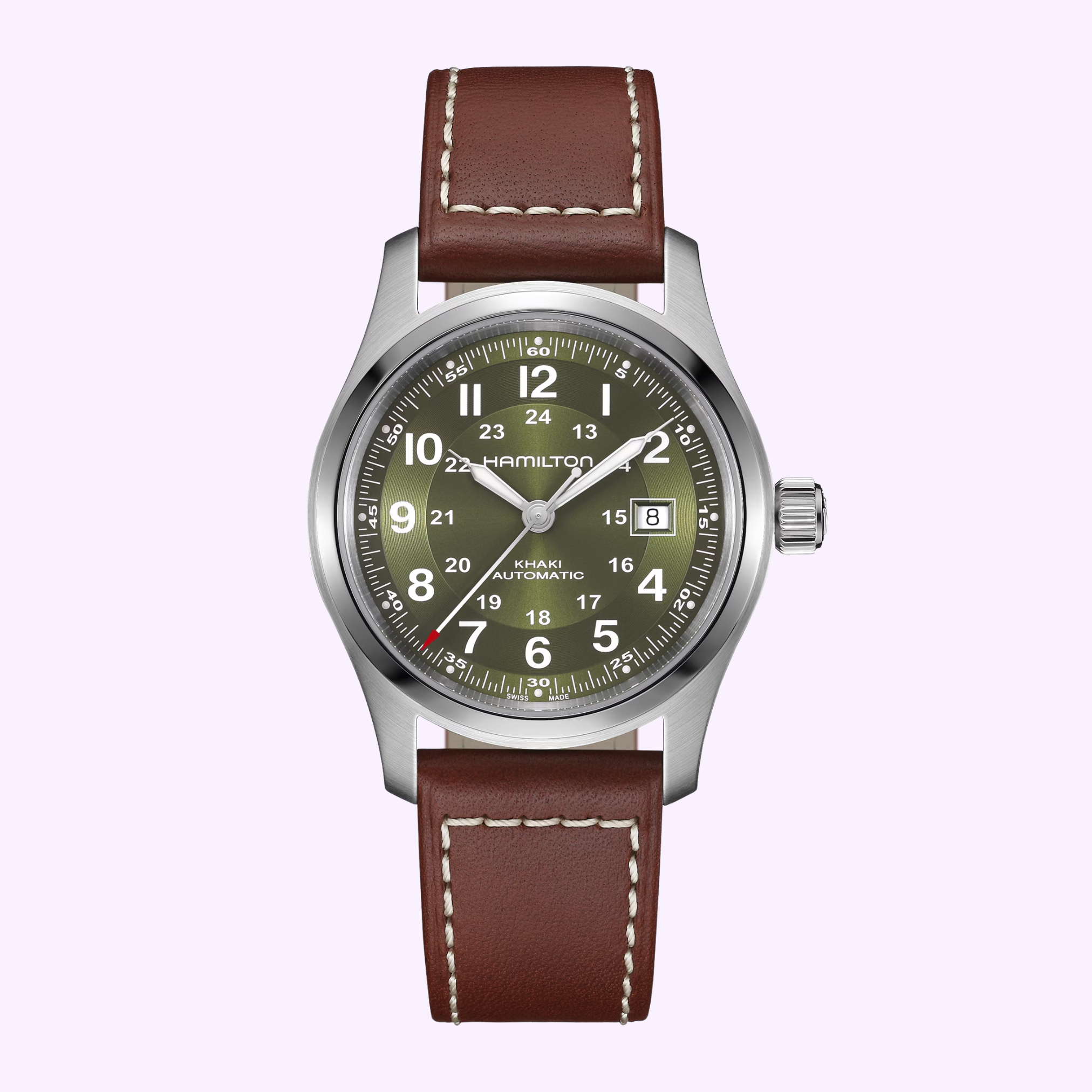 The Hamilton Watches Khaki Field Auto 42mm H70605560 features a stainless steel case, brown leather strap, olive green dial with white numerals, date window at 3 o’clock, and luminous hands, shown on a light purple background.