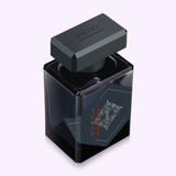A sleek, dark glass bottle with a matte black cap labeled Initio Perfumes holds SUGAR BLAST EDP 3.0 Oz unisex perfume, featuring intricate silver and red detailing on its geometric label for a captivating gourmand scent.