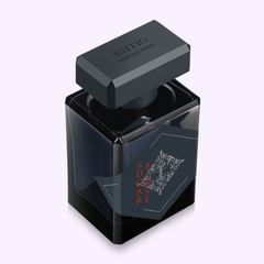 A sleek, dark glass bottle with a matte black cap labeled Initio Perfumes holds SUGAR BLAST EDP 3.0 Oz unisex perfume, featuring intricate silver and red detailing on its geometric label for a captivating gourmand scent.