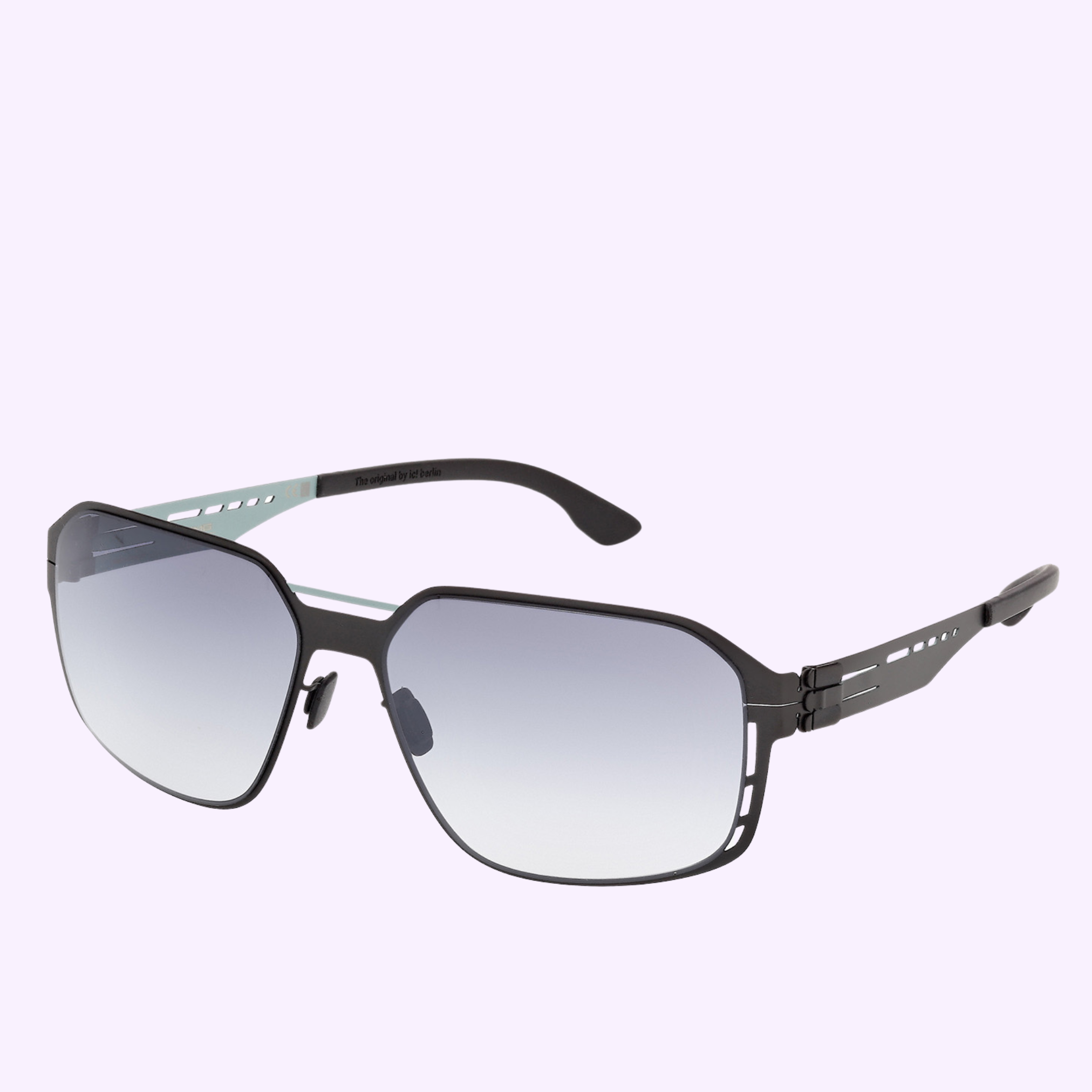 The Ic! Berlin Sunglasses IA0009 6005B feature stylish black, thin angular metal frames with cut-out arms and gradient lenses. Shown on a light purple background. Shop the latest from authorized Miami dealer.