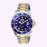The Invicta Men's 26972 Pro Diver Quartz 3 H by Invicta Watches features a blue and gold bezel, blue dial with white markers, date at 3 o’clock, and a silver/gold two-tone metal band, set against a light purple background.