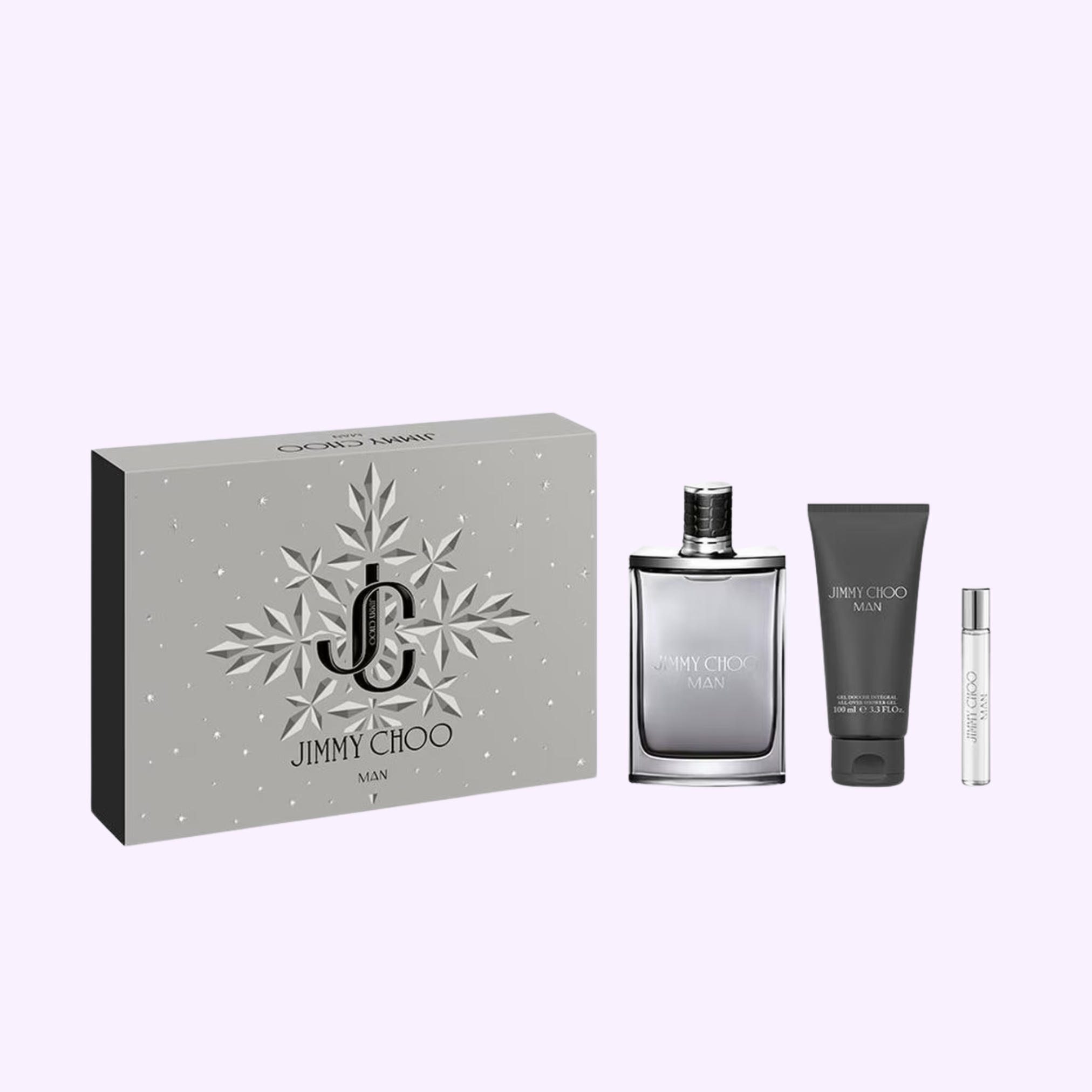 The Jimmy Choo Perfumes Man 3.3 3PC Men Set features a sleek silver and gray box, cologne, black aftershave balm tube, and spray vial—all set against a light purple background. Discover this iconic floral fruity gourmand fragrance.