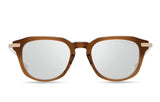 The Dita Optical Frames DLX434-A-03 LSA-434 by Dita Sunglasses feature a Copperhead Brown Japanese acetate geometric frame with silver reflective lenses and gold metal temple accents, displayed front view on a white background.