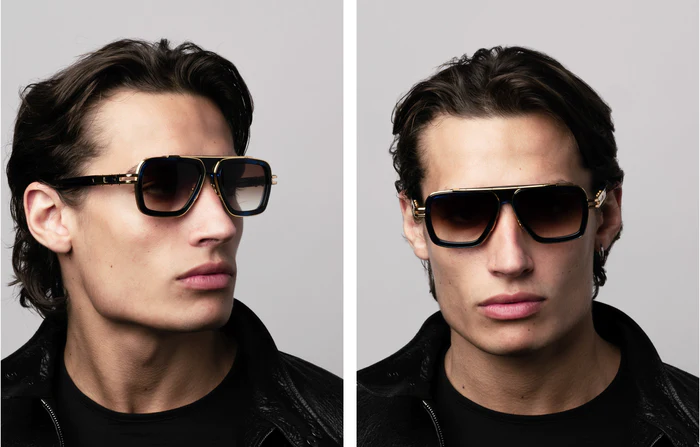 Model wearing DITA LXN-EVO navigator sunglasses with a black shirt and leather jacket, showing the frame's on-face size