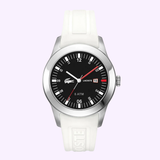 The Lacoste LC2010629 men's watch features a white strap, stainless steel bezel, black dial with white hour markers, red minute markers, Japanese quartz movement, date window at 15, and the Lacoste logo on both dial and strap.