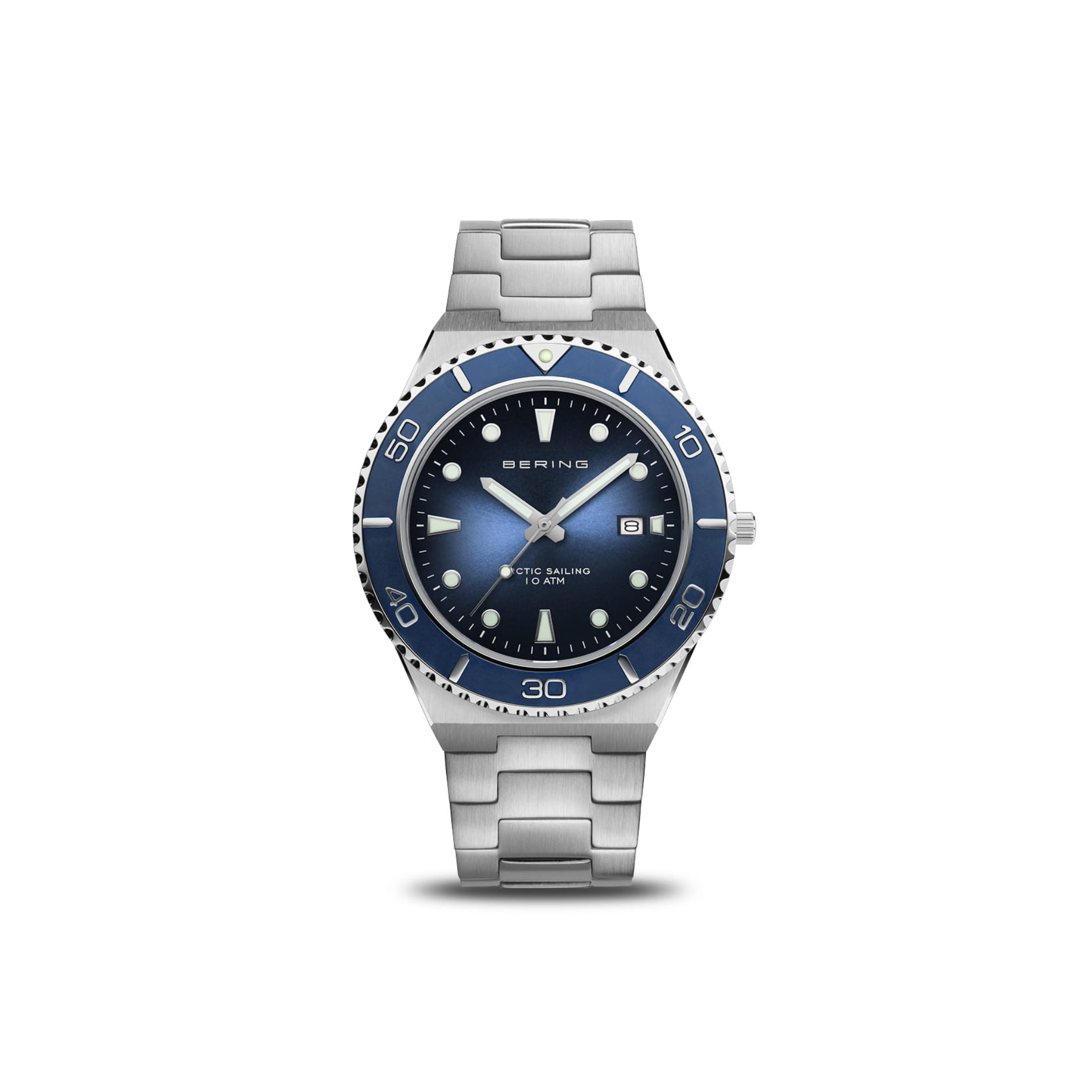 The Bering Watches 18940-707 Classic features a polished/brushed silver finish, blue bezel and dial, white hour markers, date at 3 o’clock, and “Bering” on the face. Displayed on a white background. Inspired by explorer Vitus Bering.