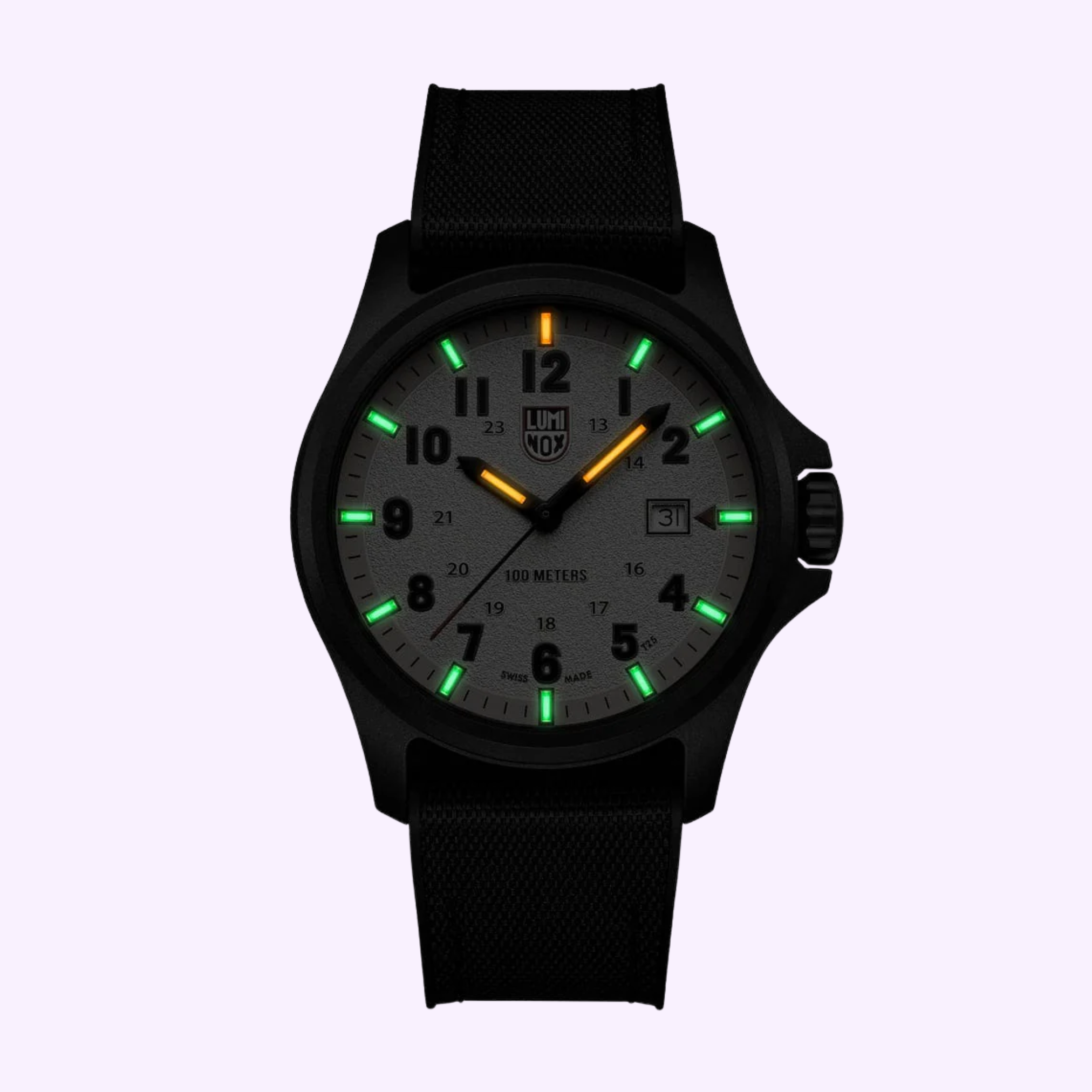 The Luminox Watches Atacama Field XL.1971.SET features a black CARBONOX case, gray dial, black numerals, luminous markers, orange 12 o’clock marker, green 3/6/9 markers, glowing white others, and a date window at 3.