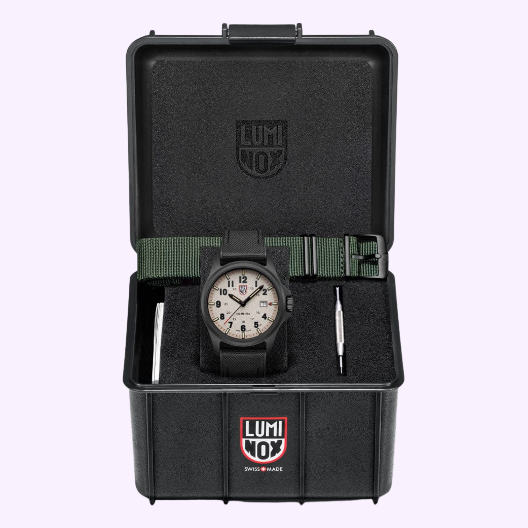 The Luminox Watches Atacama Field XL.1971.SET features a 43mm CARBONOX case, green fabric strap, tool, and comes in a foam-lined black box with Luminox Watches branding on the lid and front panel.