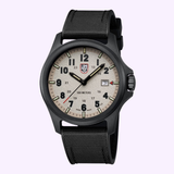 The Luminox Watches Atacama Field XL.1971.SET features a 43mm CARBONOX case, beige dial with black numerals, date window at 3 o’clock, black hands, textured black strap, and is water resistant to 100 meters.